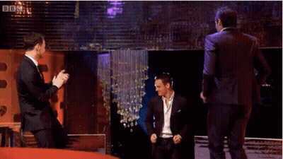 Three Men In Suits Are Dancing On A Stage With Bbc Written On The Bottom Right GIF