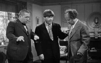 Three Men In Suits Pointing In Living Room GIF