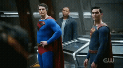 Three Men In Superman Costumes GIF