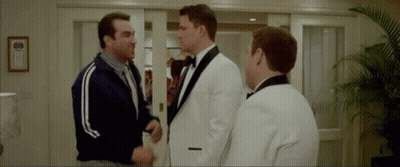 Three Men In Tuxedos Shaking Hands GIF