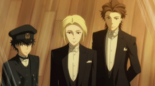 Three Men In Tuxedos Stand Next To Each Other GIF