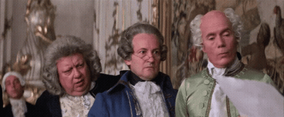 Three Men In Wigs One Wearing Glasses GIF