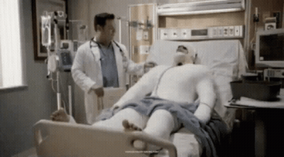 Three Men Laughing, One In Number 4 Jersey GIF