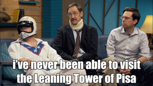 Three Men On Couch One With Helmet GIF