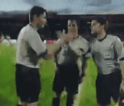 Three Men On Soccer Field Wearing UA Shirt GIF