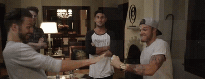 Three Men One Wearing Onepper Shirt GIF