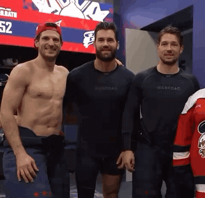 Three Men Posing In Locker Room GIF