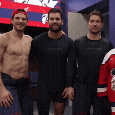 Three Men Posing One In Warroad Shirt GIF
