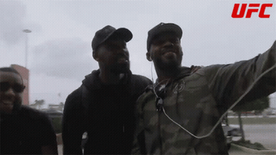 Three Men Posing With UFC Logo GIF