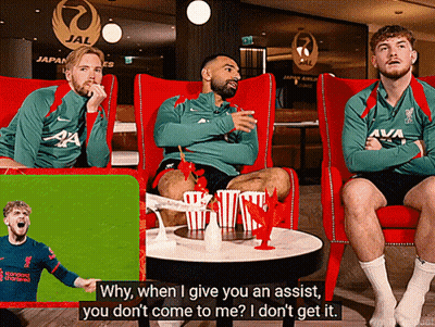 Three Men Red Chairs One Wearing Liverpool Jersey GIF
