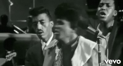 Three Men Singing Into Microphones In Band GIF