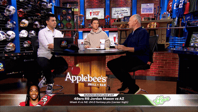 Three Men Sit At An Applebee 'S Table Talking GIF