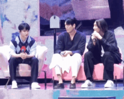 Three Men Sitting On Pink Couch Talking GIF