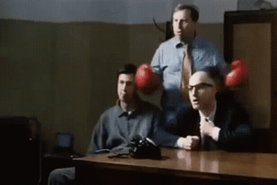 Three Men Sitting With Boxing Gloves GIF