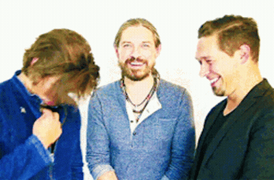 Three Men Smiling Together GIF