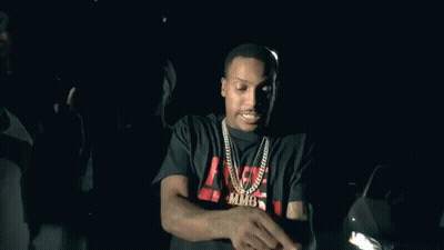 Three Men Standing In Dark Room GIF