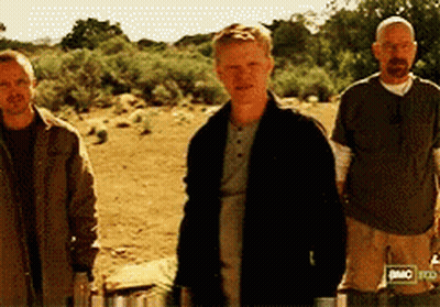 Three Men Standing Next To Each Other With A T-Shirt That Says A.m.c. On It GIF