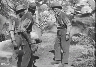 Three Men Standing With Caption Lips