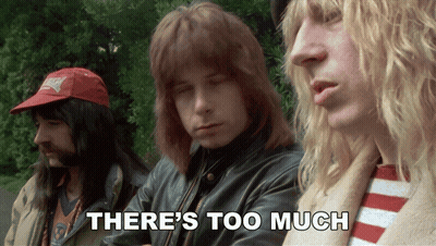Three Men Standing With Saying There's Too Much GIF