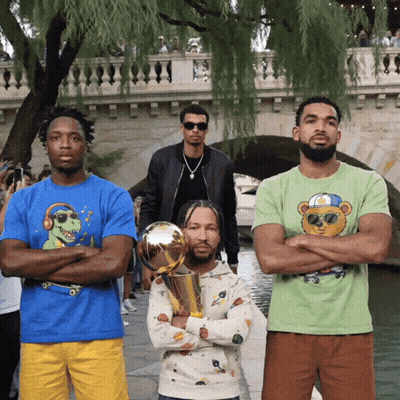 Three Men With Arms Crossed Holding Trophy GIF