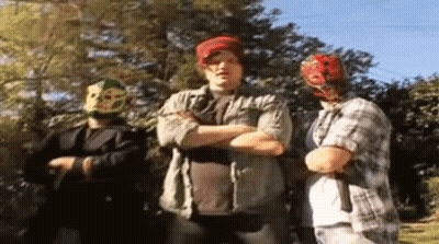 Three Men With Arms Crossed, One Masked GIF