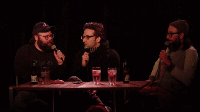 Three Men With Microphones And Scoop GIF