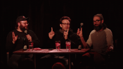 Three Men With Microphones And Yellow Scoop GIF