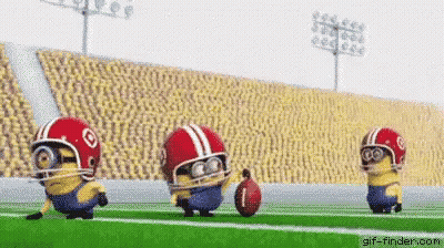 Three Minions Are Playing Football On A Field Wearing Helmets And Holding A Football . GIF
