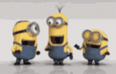 Three Minions Laughing Together GIF