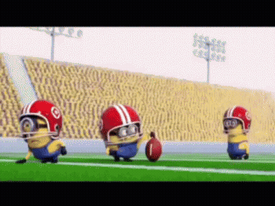 Three Minions Wearing Football Helmets Are Running On A Field With A Ball GIF