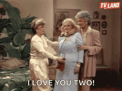 Three Older Women Standing In Living Room Saying I Love You Two GIF