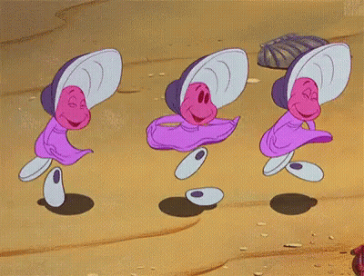 three oysters from alice in wonderland are dancing on a beach