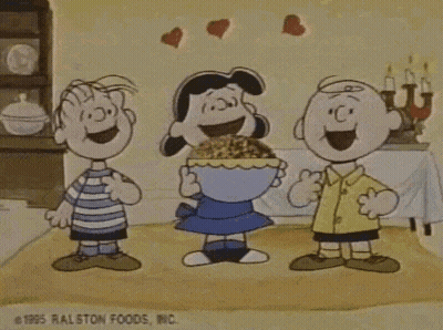 Three Peanuts Characters Standing In Room GIF