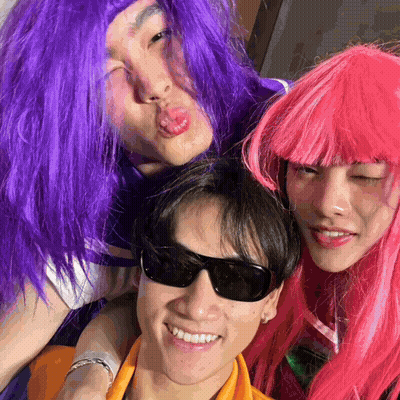 Three People In Wigs And Sunglasses Posing GIF