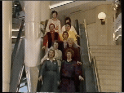 Three People In Wigs And Sunglasses Posing GIF