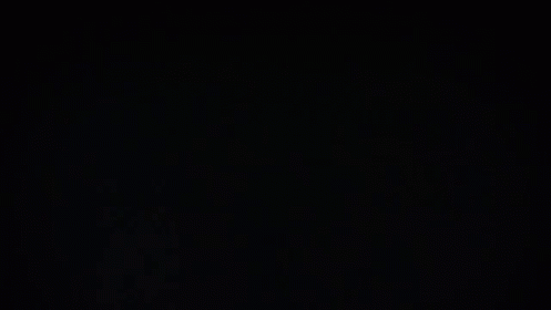 Three Phones Are Being Held In Someone 'S Hands And One Of Them Has A Graphic On The Screen That Says 00000K GIF