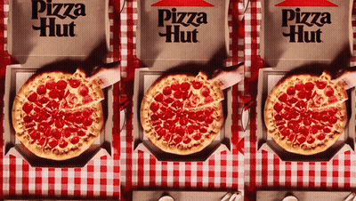 Three Pizza Hut Boxes Are Lined Up On A Checkered Tablecloth GIF