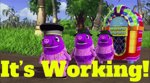 Three Purple Pigs Are Standing In Front Of A Jukebox That Says It 'S Working ! GIF