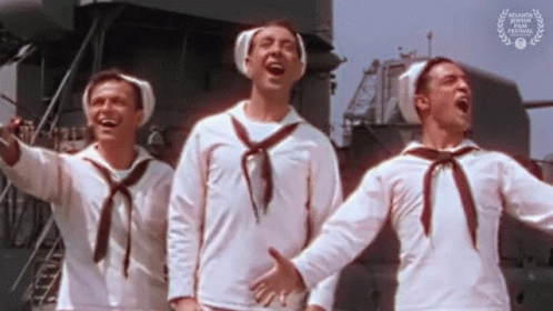 Three Sailors Singing In Front Of Ship With Atlanta Short Film Festival Award GIF