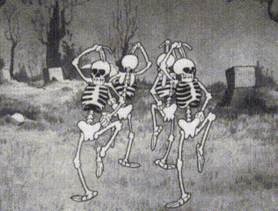 Three Skeletons Dancing In Cemetery Black And White Cartoon GIF