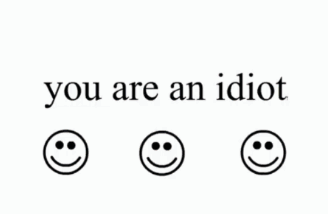 Three Smiley Faces With The Words " You Are An Idiot " Below Them GIF