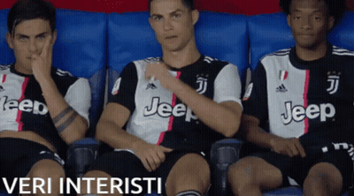 Three Soccer Players In Jeep Jerseys Sitting On Bench GIF