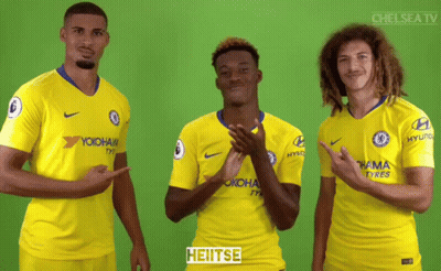 Three Soccer Players In Yellow Jerseys GIF