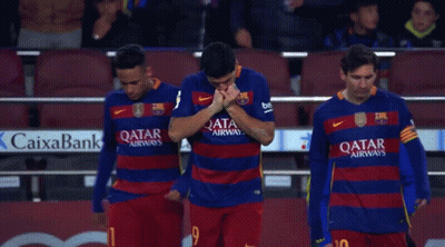 Three Soccer Players Wearing Qatar Airways Jerseys Stand Together GIF