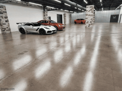 Three Sports Cars Are Parked In A Garage With Imgflip.com At The Bottom Right GIF
