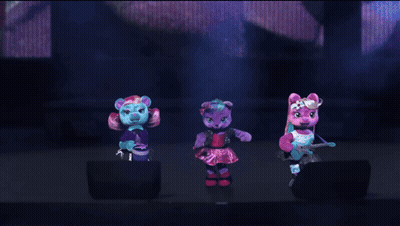 Three Stuffed Animals Are Dancing On A Stage And One Has A Microphone In Her Hand GIF