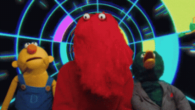 Three Stuffed Animals Including Elmo GIF