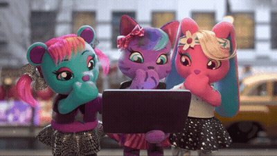 Three Stuffed Animals Looking At A Laptop Together GIF