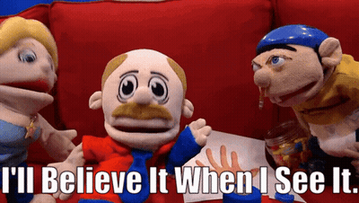 Three Stuffed Animals On Red Couch GIF