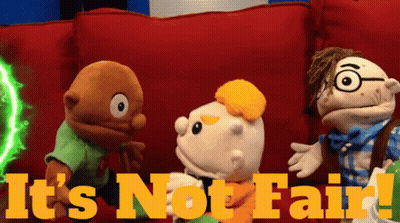 Three Stuffed Animals Sitting On A Red Couch With The Words " It 'S Not Fair " On The Bottom GIF
